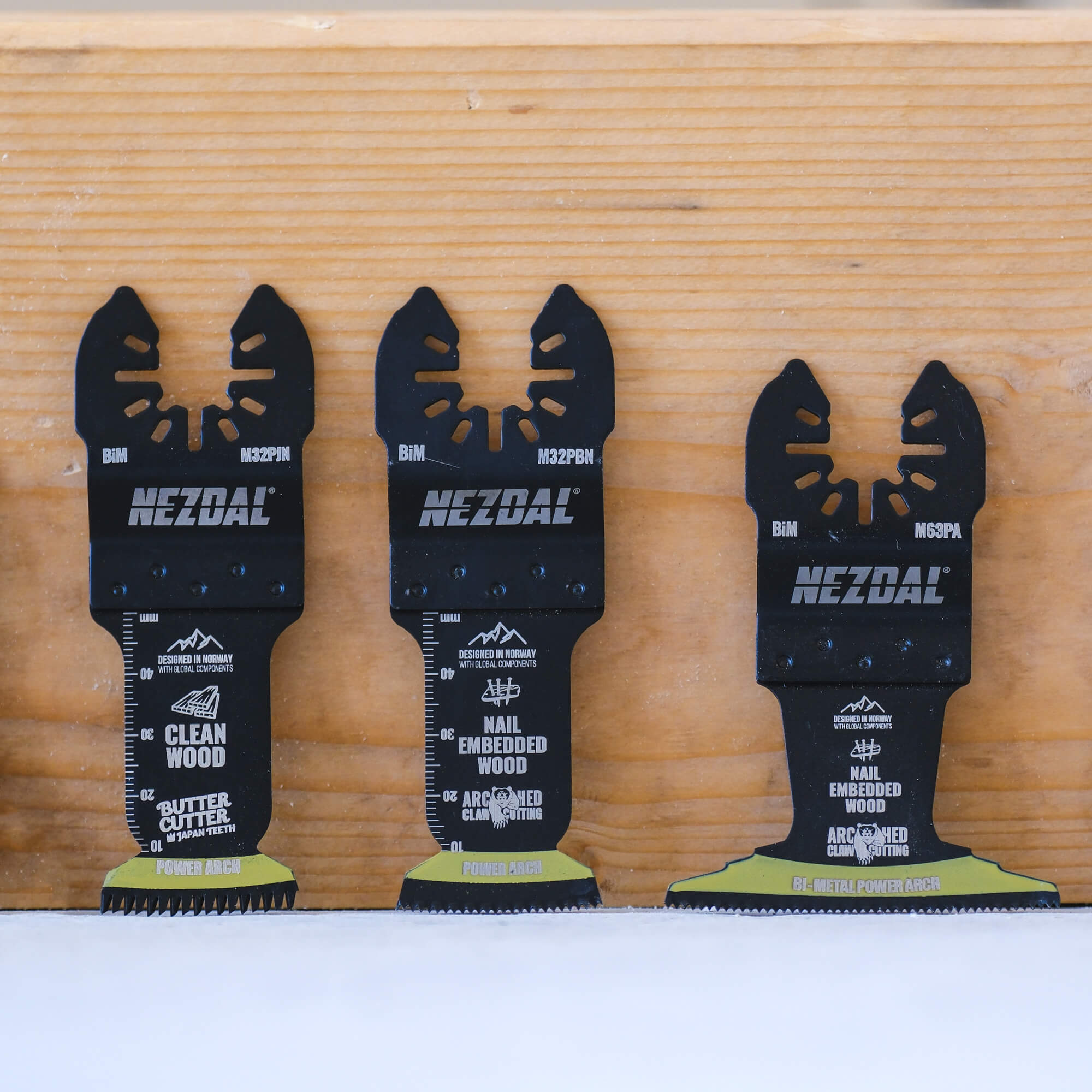 3 multi-tool blades with curved edge besides each other